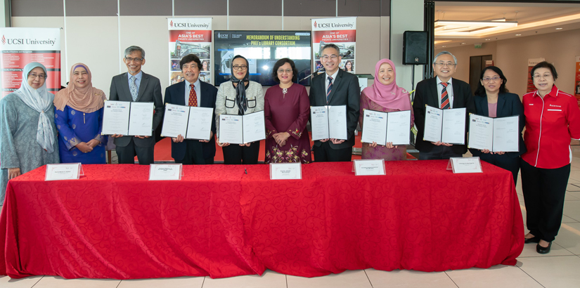Strategic partnership: Prof Datuk Dr Siti Hamisah Tapsir (fifth from left) and Prof Dr Azlinda Azman (sixth from right) with academic members of participating universities during the MoU signing ceremony