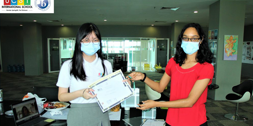 MYP5 student Crystal Huang Xiao Hui received the cash prize, certificate from the UCSI Group SDG Secretariat Office, appreciation certificate and gift bag.